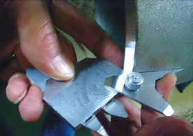 Weld gauge checking a bevel angle.