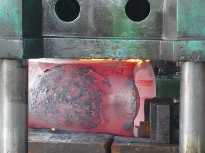 Red-hot workpiece in the forming die.