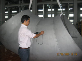 Ultrasonic wall thickness measurement on a formed head.