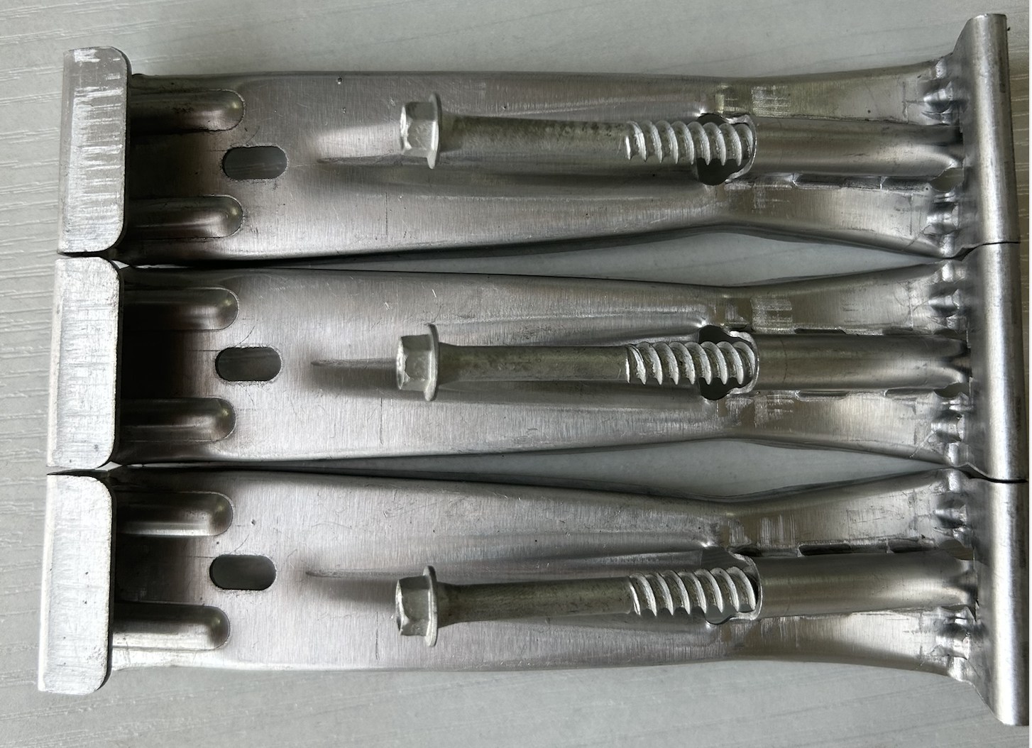 Steel hangers supplied packed with fixing screws.